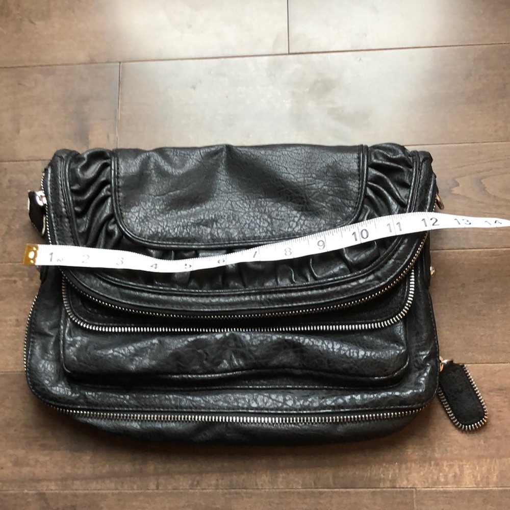 BCBG clutch bag. Never used. Not real leather.